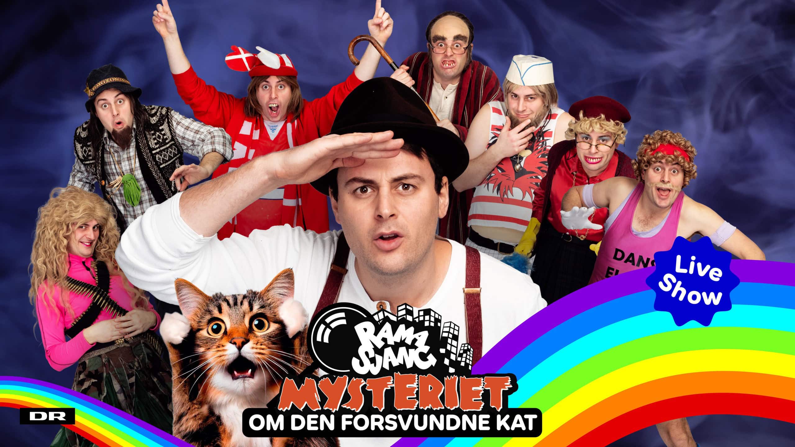 Mini spionerne i sjovt scenarie Gruppespil med børn og voksne i kostumer til live show.
