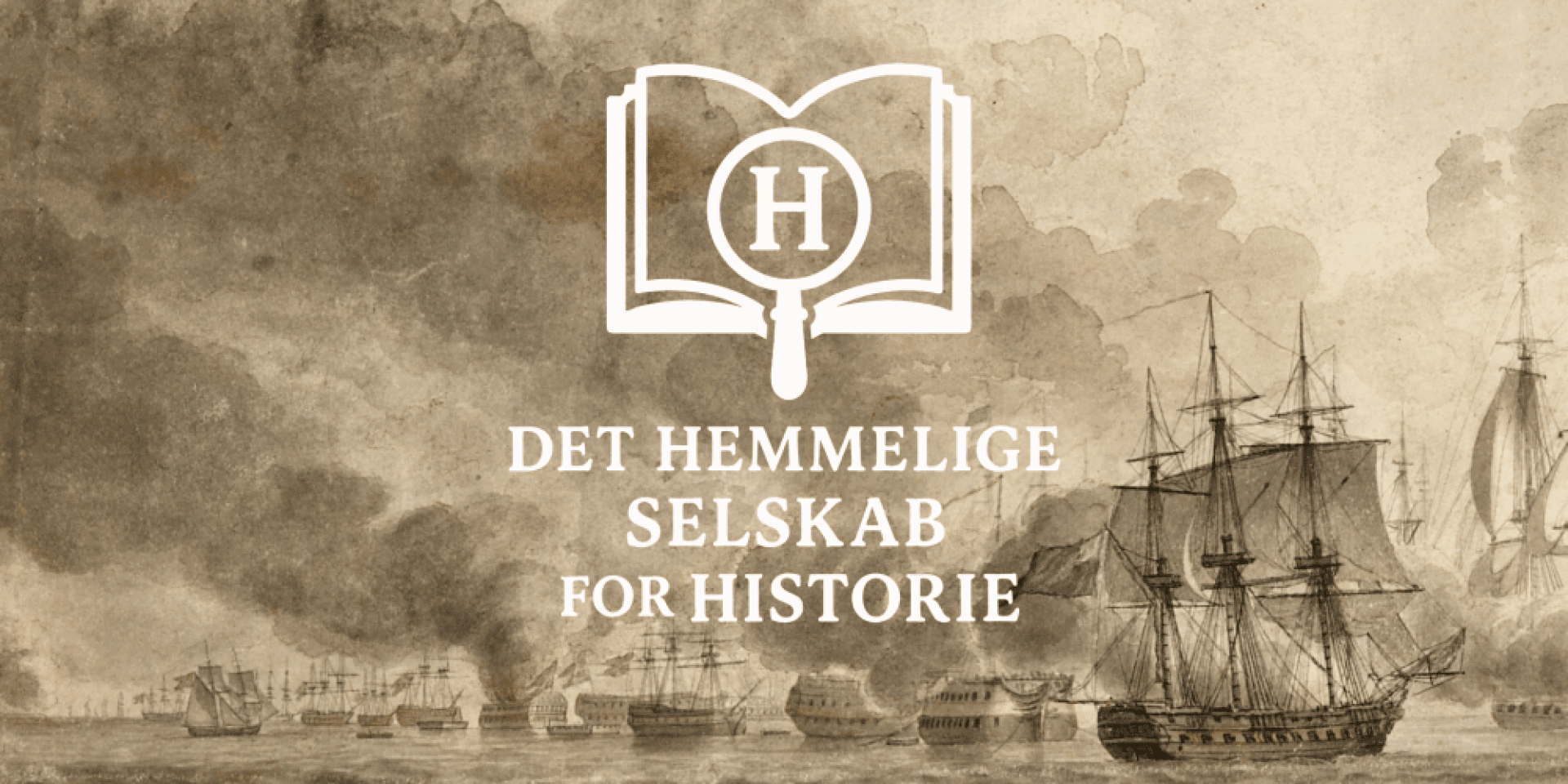 Gamle sejlskibe og havn i Sønderborg med historisk atmosfære.